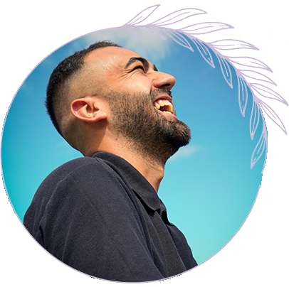 Acceptance and Commitment Therapy (ACT)- Living with purpose Man smiling and looking upward outdoors, representing acceptance and commitment therapy, psychological flexibility, and living with purpose